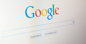 Close-up of the classic Google homepage search bar on a computer screen